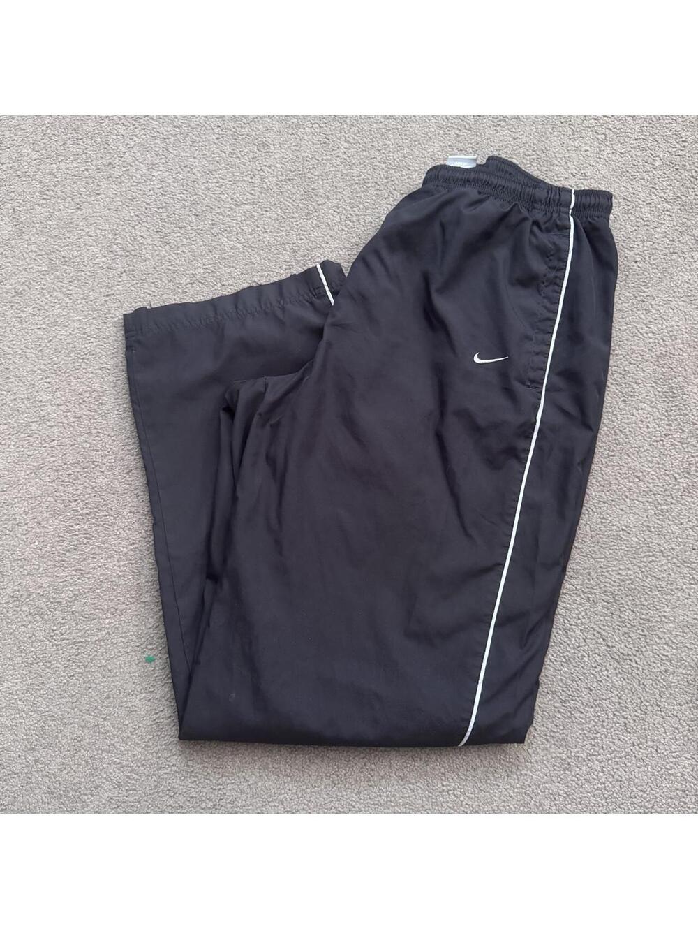 Vintage Y2K Black Nike Swoosh Track pants with white side stripes